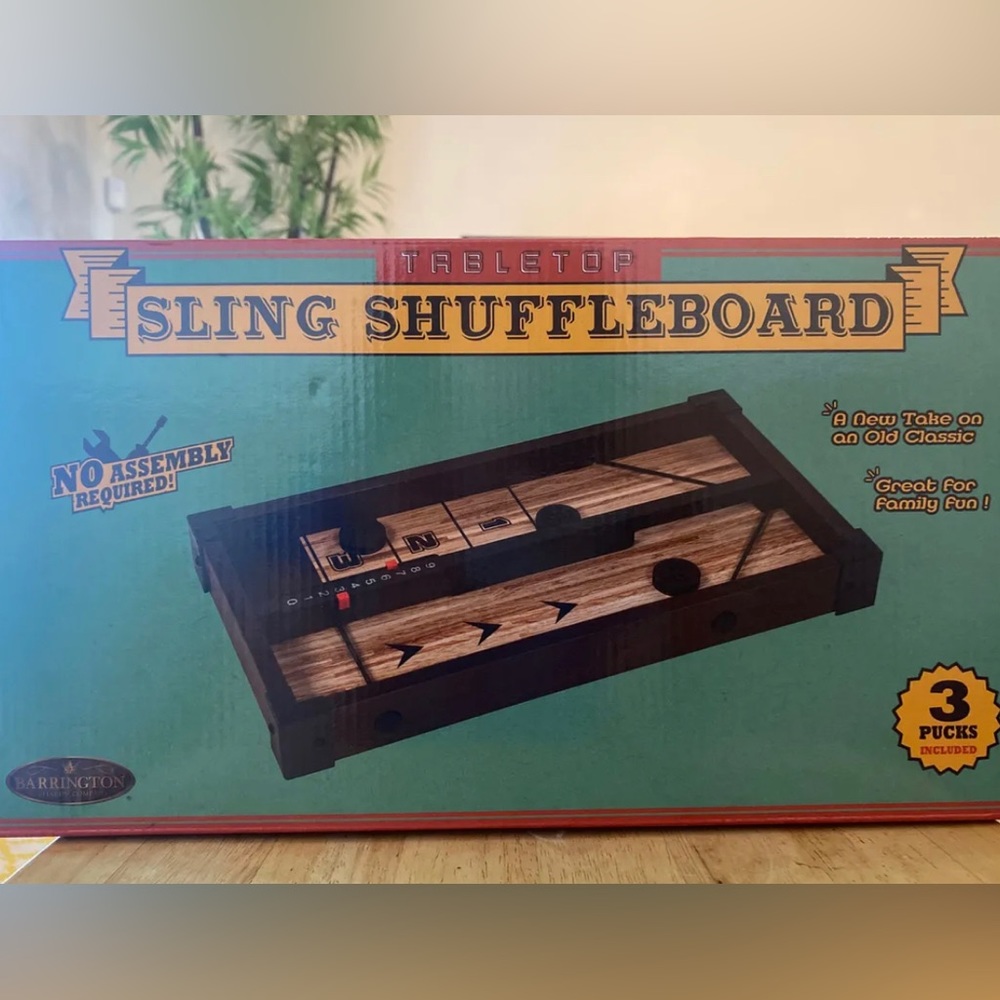 Tabletop sling shuffleboard